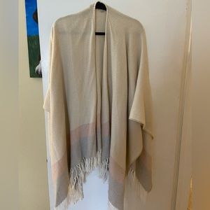 Loft wrap with fringe and herringbone pattern